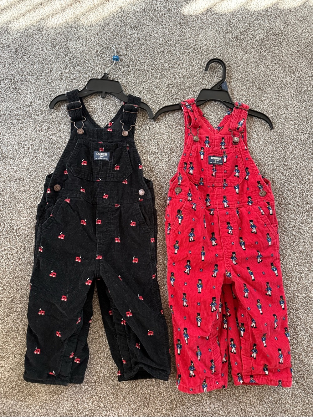 OshKosh B'gosh Red and Black Corduroy Overalls with Toy Soldier and trains